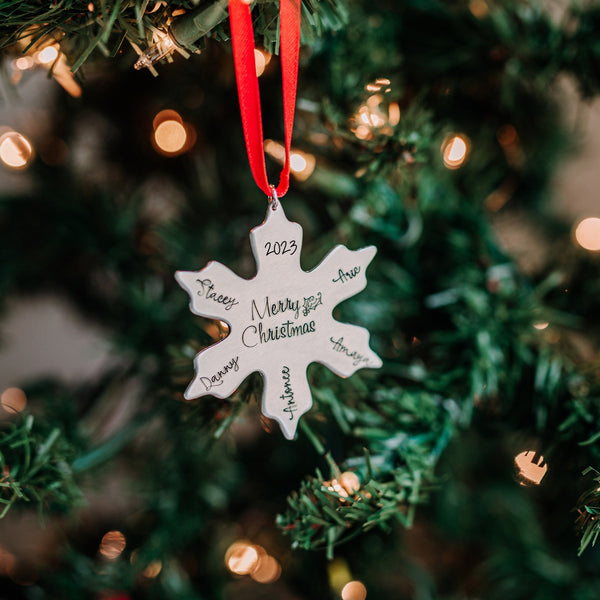 Snowflake Family Christmas ornament on red ribbon