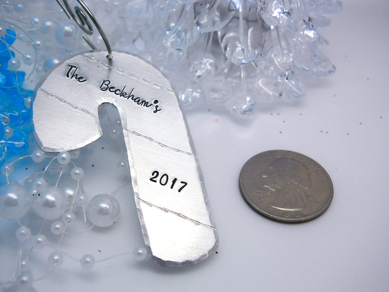Personalized Candy Cane Christmas Ornament, size comparison to a quarter