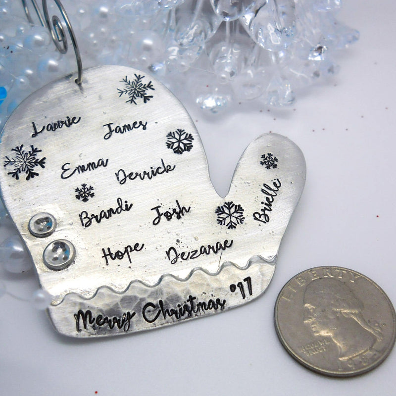 Personalized Mitten Christmas ornament, pewter next to a quarter for size