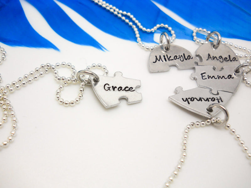 Best Friends Heart Puzzle Necklace 5 Piece Set, one piece removed